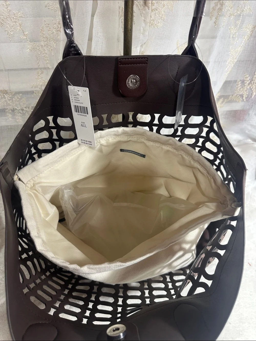 Anthropologie faux Seude perforated slouchy chocolate bag with canvas insert